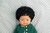 Blank babyjongen met donker krullend haar (38 cm)