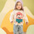 Babypop Jeanne met draagzak